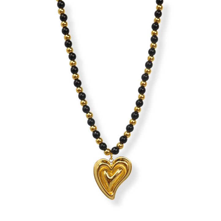 Collar Karla - bolita oro y negro - corazón en relive - estilo 1