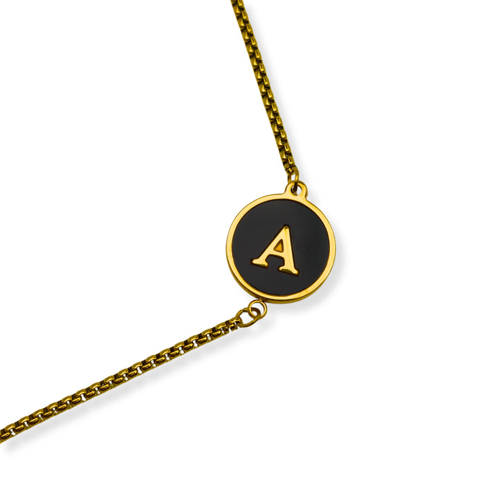 Pulsera con inicial - oro y negro - letras A a Z - ajustable